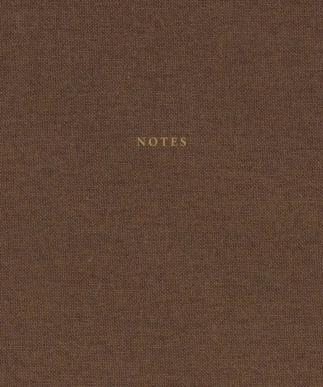Notizbuch mit braunem Leinenbezug und goldenen Details