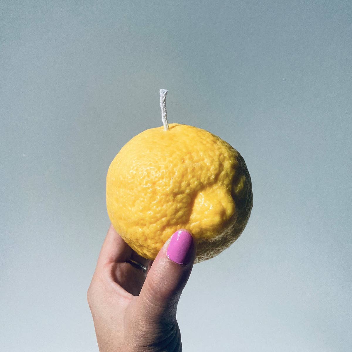 Große Kerze in Zitronenform: Lemon / Schale von Zitrusfrüchten / Einzelne Zitrone